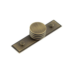 Sturt Cupboard Knobs 40mm Stepped Antique Brass - Hoxton Kits
